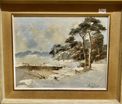 Lot 8 - A winter landscape surrounded by woodland, oil...