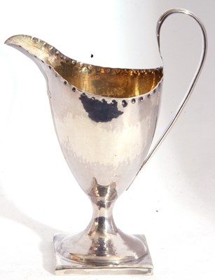 Lot 10 - George III silver pedestal cream jug of helmet...