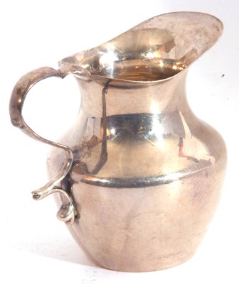 Lot 11 - Victorian silver small cream jug, the plain...
