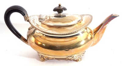 Lot 19 - George V silver cushion shaped tea pot with...