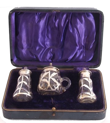 Lot 25 - Cased matched three piece glass and silver...