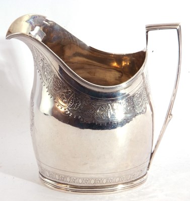 Lot 27 - George III silver cream jug of helmet shape,...