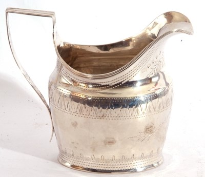 Lot 31 - George III cream jug of helmet shape, the body...