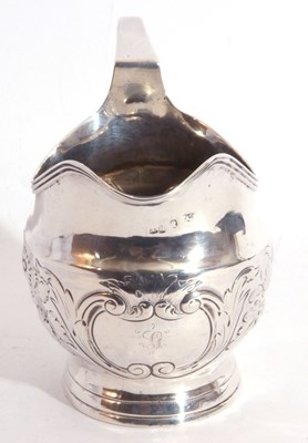 Lot 35 - Georgian silver cream jug of helmet shape,...