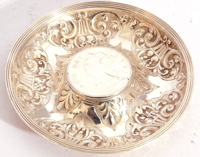 Lot 38 - White metal dish of circular form, embossed...