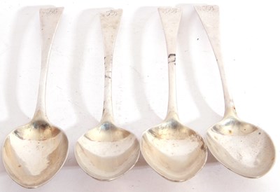 Lot 44 - Set of four Georgian Old English table spoons...