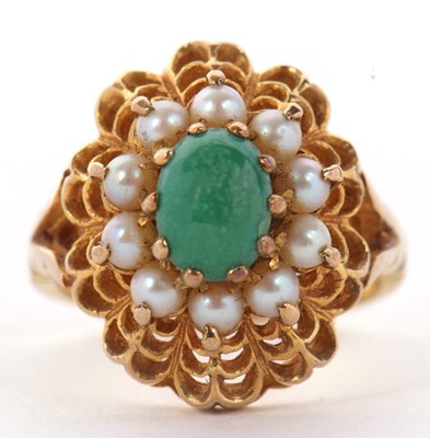 Lot 26 - A 9ct turquoise and split pearl ring, the...