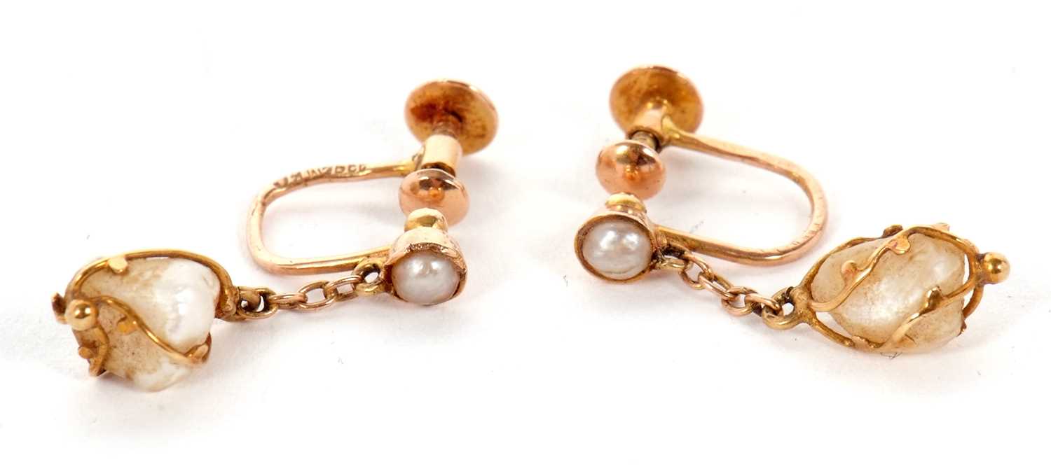 Lot 66 - A pair 15ct 'pearl' earrings, the baroque...