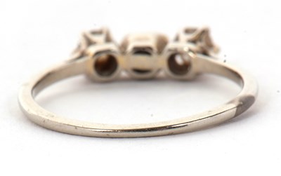 Lot 29 - A diamond and 'pearl' ring, the central...