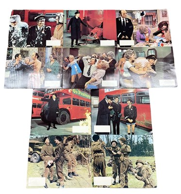 Lot 142 - A set of 8 Mutiny On The Buses lobby cards,...