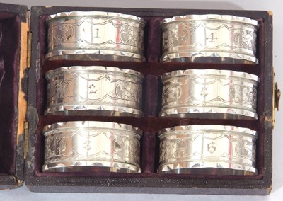 Lot 77 - Six Victorian napkin rings, engraved bodies...