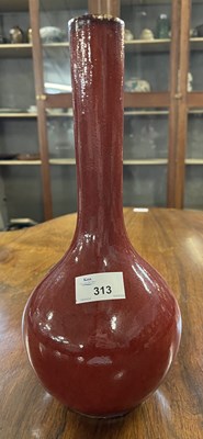 Lot 313 - A Chinese flambe bottle vase, in a sdb glaze,...