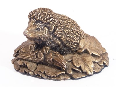 Lot 86 - Modern silver hedgehog paperweight, seated in...