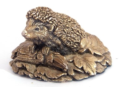 Lot 86 - Modern silver hedgehog paperweight, seated in...