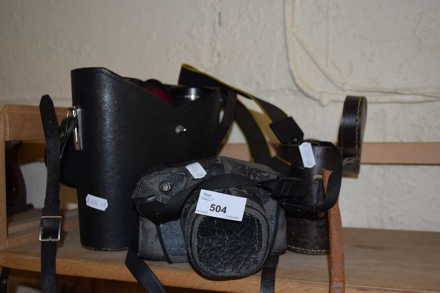 Lot 504 A Pentax SLR camera and case together with a