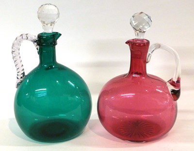Lot 307 - Two decanters, one green glass the other...