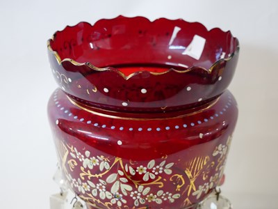 Lot 295 - A cranberry glass table lustre with painted...