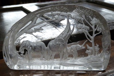 Lot 315 - A clear glass paperweight block with frosted...