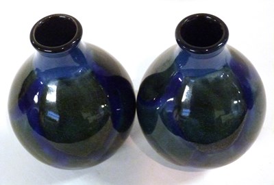 Lot 316 - A small pair of Poole vases of baluster shape,...