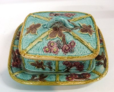 Lot 328 - A Maiolica dish and cover, decorated in relief...