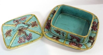 Lot 328 - A Maiolica dish and cover, decorated in relief...