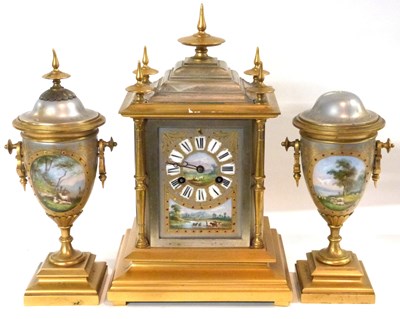 Lot 339 - A late 19th Century clock garniture with...