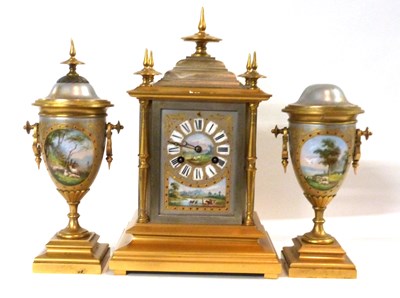 Lot 339 - A late 19th Century clock garniture with...