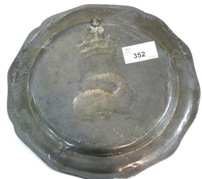 Lot 352 - A pewter heraldic dish with touch marks to the...
