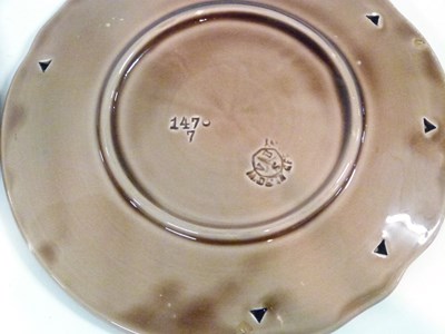 Lot 354 - A pair of German pottery Art Nouveau plates...