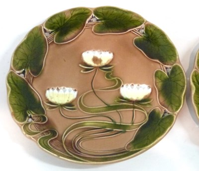 Lot 354 - A pair of German pottery Art Nouveau plates...