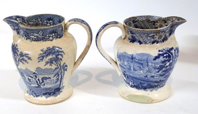 Lot 357 - Two 19th Century Staffordshire flow blue jugs,...
