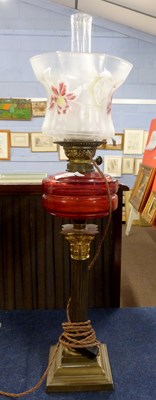 Lot 370 - A late 19th Century oil lamp with Corinthian...