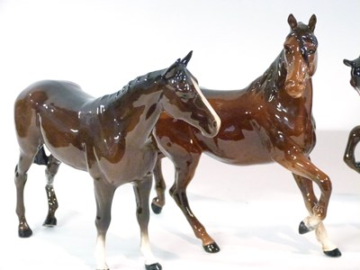Lot 404 - A group of four Beswick horses (one with leg a/f)