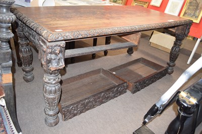 Lot 457 - Victorian gothic oak writing table of...