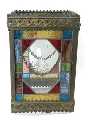 Lot 486 - An Arts & Crafts style coloured lead glazed...