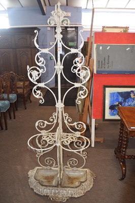 Lot 500 - A white painted cast iron hall stand with...