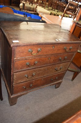 Lot 511 - A George III oak chest of drawers of small...