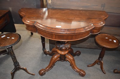 Lot 527 - A Victorian rosewood tea table with shaped...