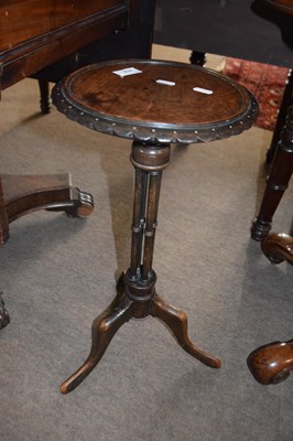 Lot 516 - A small mahogany wine table with circular top,...