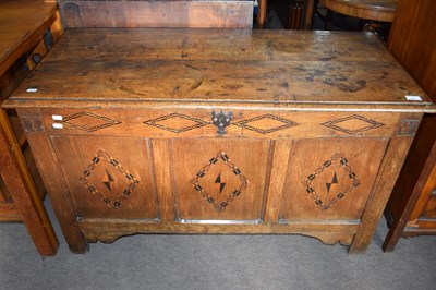 Lot 520 - An 18th Century oak coffer with three panelled...