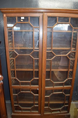 Lot 558 - A Victorian oak bookcase cabinet with two...