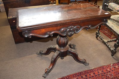 Lot 574 - A Victorian rosewood pedestal card table with...