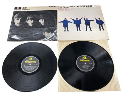 Lot 174 - A pair of BEATLES 12" vinyl LPs, with black...