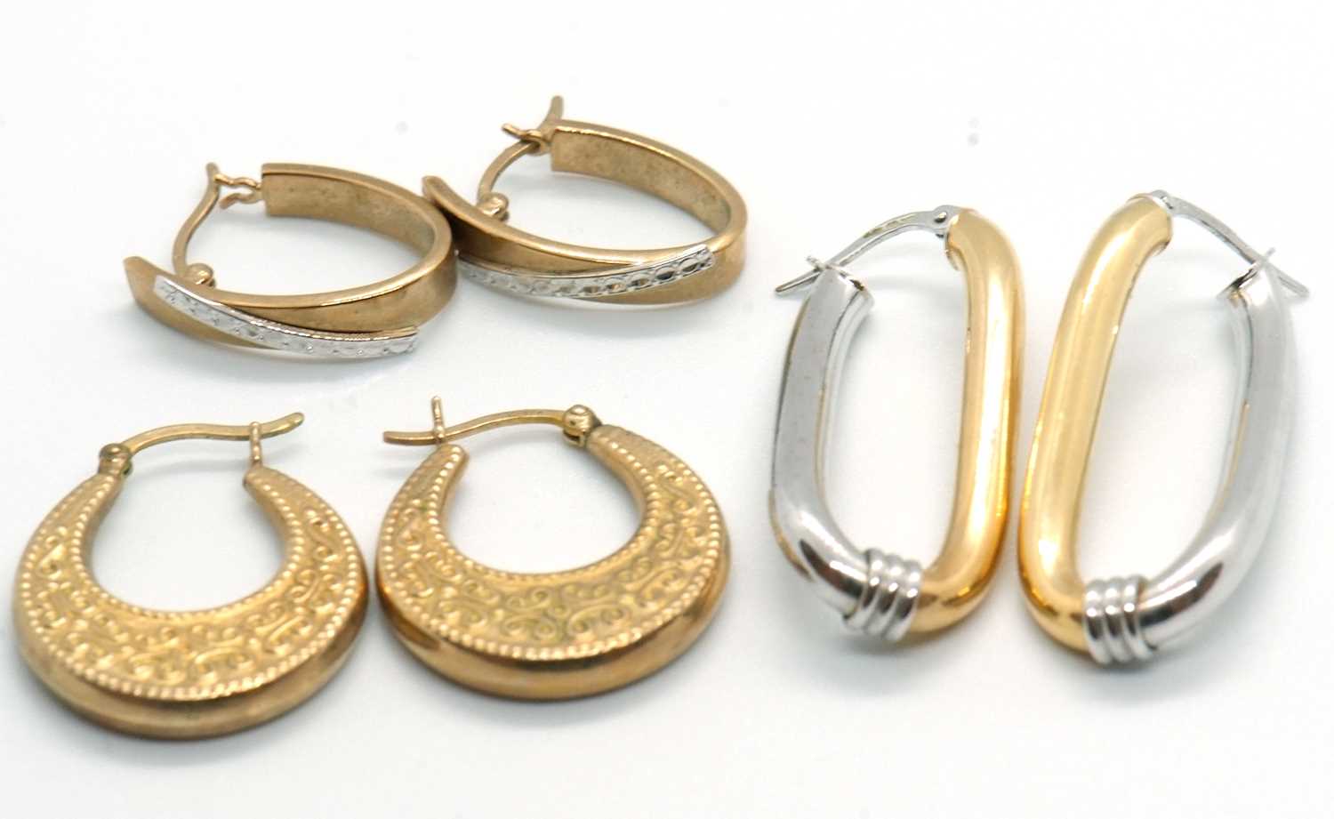 Lot 208 - Three pairs of 9ct earrings, to include a