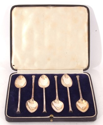 Lot 180 - Cased set of six George V tea spoons with cast...