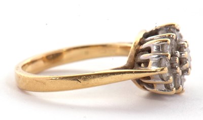 Lot 76 - An 18k diamond ring, the navette shaped...