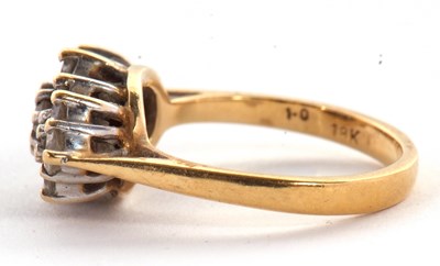 Lot 76 - An 18k diamond ring, the navette shaped...