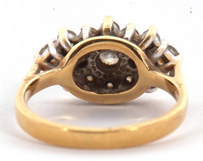 Lot 76 - An 18k diamond ring, the navette shaped...