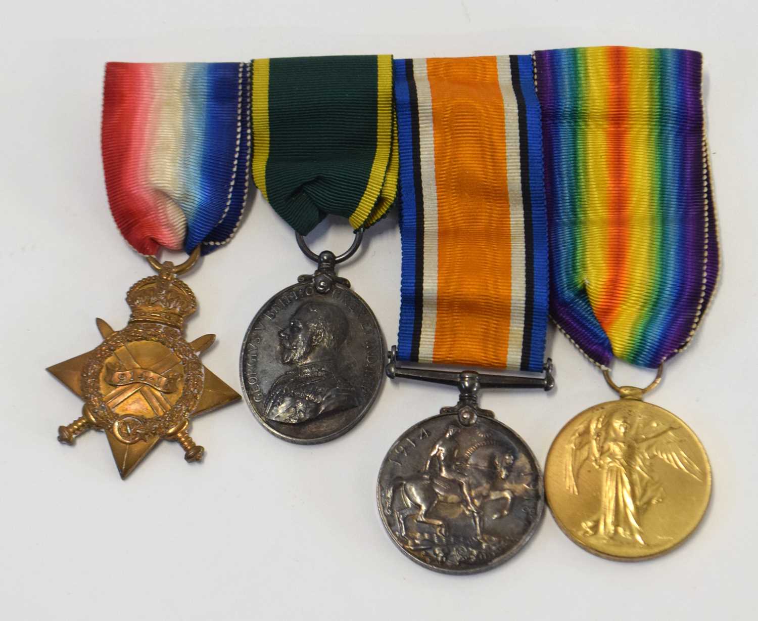Lot 58 - First world war British medal group of four,...