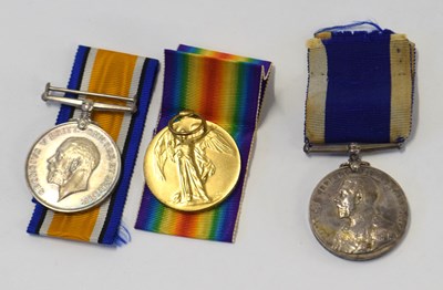 Lot 65 - First world war medal group of three,...